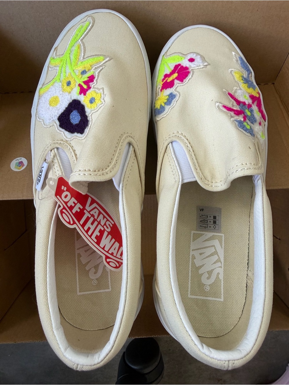 Vans Women's Slip-On Canvas Sneakers with Neon Floral Appliqués in Cream
